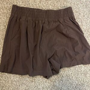 Vuori Women's Athletic Shorts in Brown